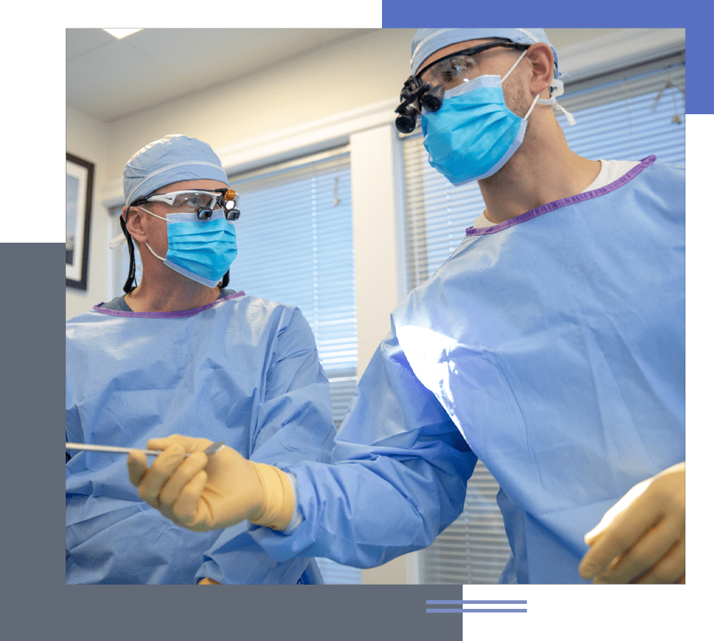 oral surgeons performing dental surgery
